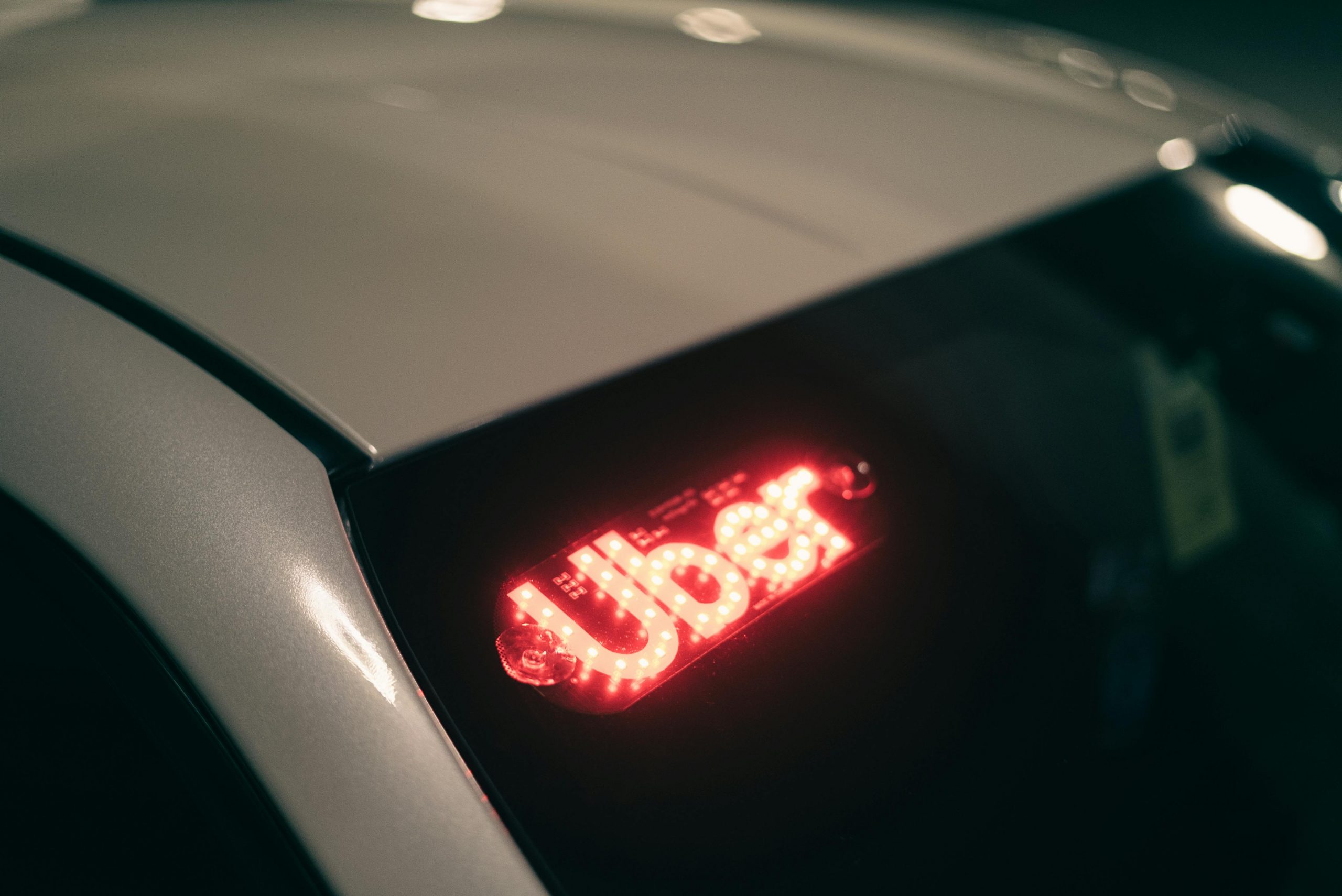 Uber LED sign mounted on a car windshield